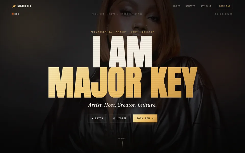 Home page of the I AM MAJOR KEY artist site, with a large gold title over a dark portrait
